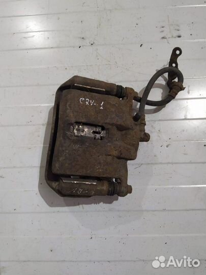 Суппорт тормозной передний Honda Cr-V внедорожник