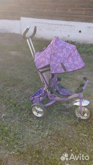 Трехколесный велосипед с ручкой