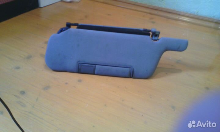 Солнцезащитный козырёк правый на Форд Фиеста