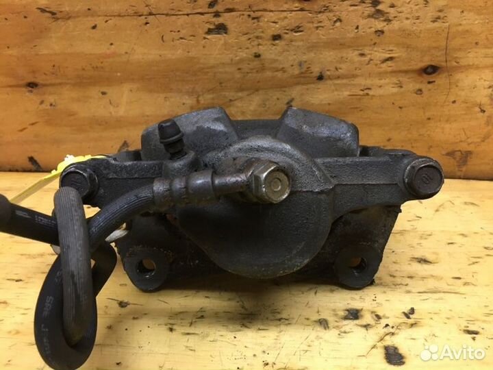 Суппорт передний левый Toyota Corona Premio ST210