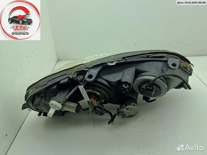 Фара левая б/у Opel Astra G 09121810
