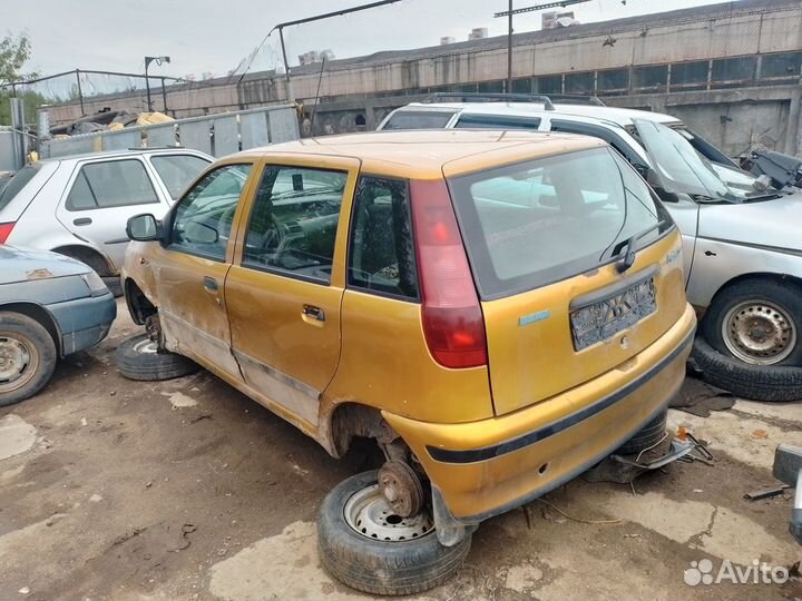 Суппорт правый левый Fiat Punto 75 176