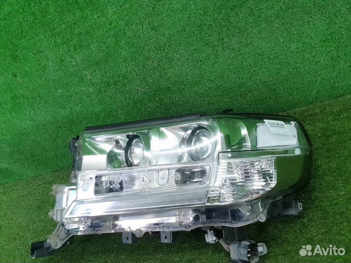 Фара левая Toyota Land Cruiser