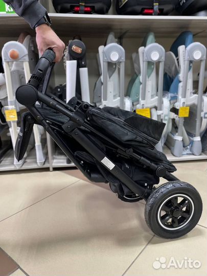 Новая всесезонная коляска на надувных колесах