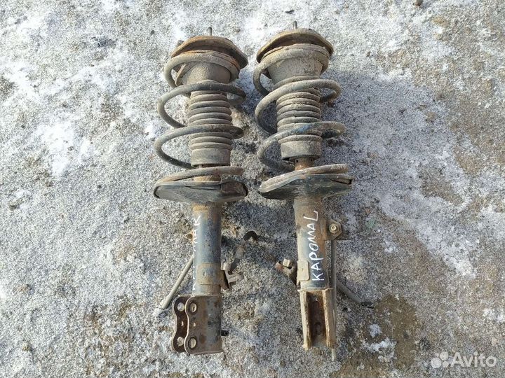 Передние стойки toyota corolla e120