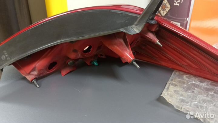 Фонарь левый задний Nissan Tiida C11