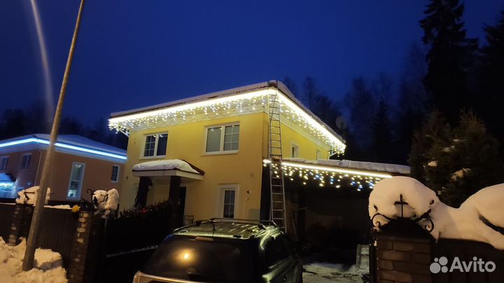 Световое оформление фасадов зданий к Новому году