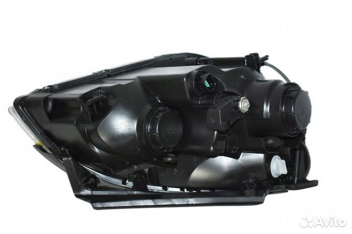 Фара левая Kia Carens