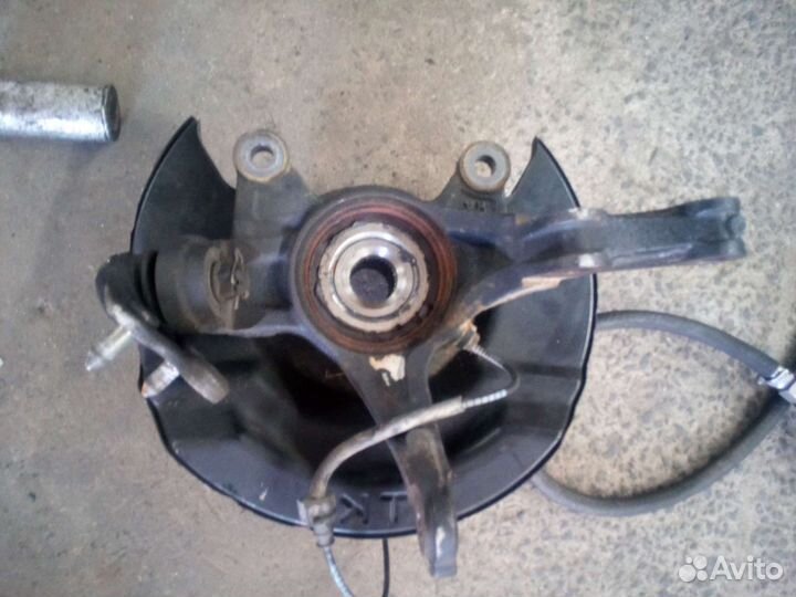 Ступица.Кулак поворотный передний,цапфа задняя