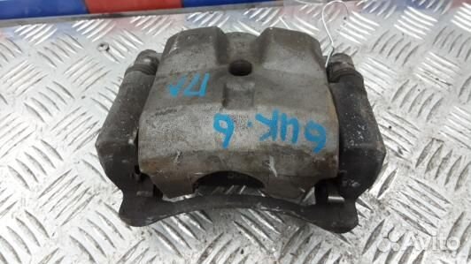 Суппорт тормозной передний левый toyota prius XW30