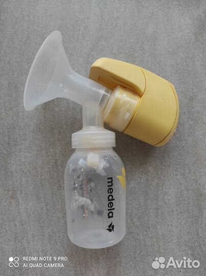 Молокоотсос medela электрический