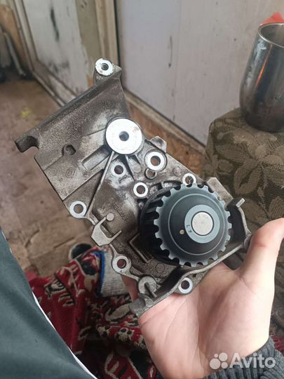 Помпа рено логан 1