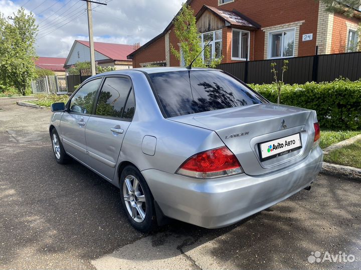 Mitsubishi Lancer 1.6 МТ, 2005, 301 000 км