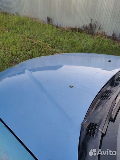 Капот Mitsubishi Carisma Ресталинг