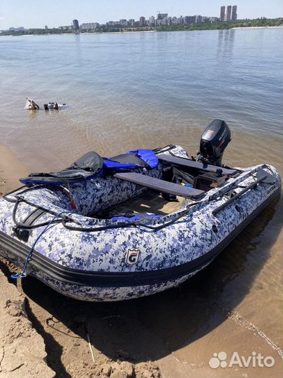 Лодка с мотором и прицепом