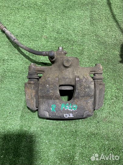 Передний правый тормозной суппорт VW Polo 5