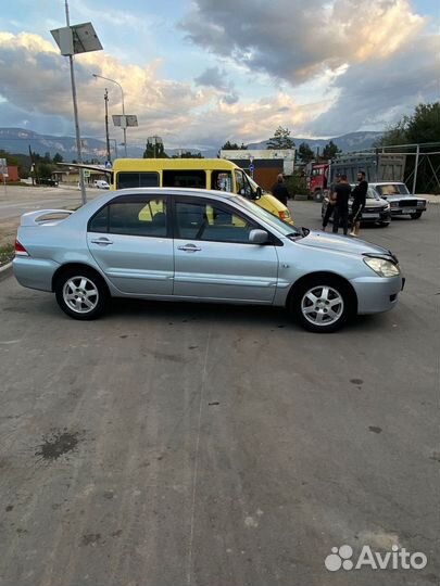 Mitsubishi Lancer 1.6 МТ, 2006, 237 000 км