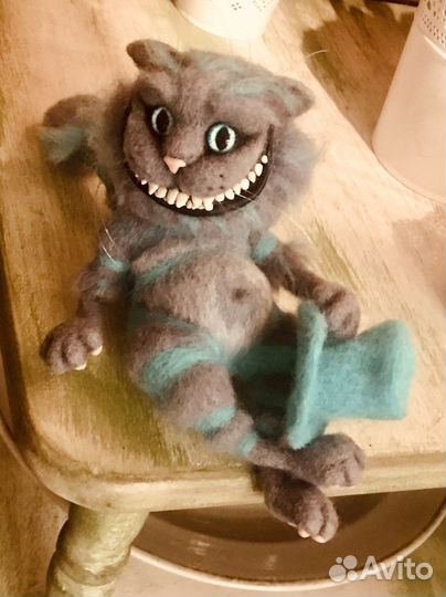 Чеширский кот из Асилы в стране Чудес