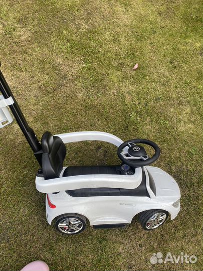 Машинка каталка с ручкой