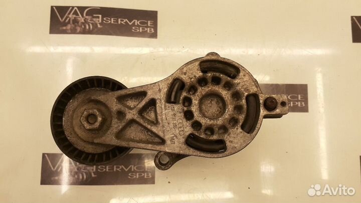 Ролик натяжитель ремня с кронштейном VAG VW BWA