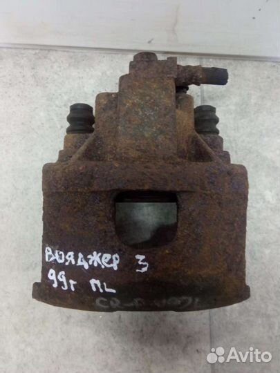 Суппорт тормозной передний левый Chrysler Voyager