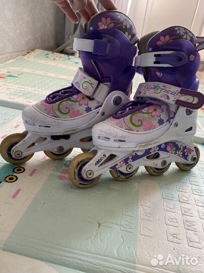 Роликовые коньки