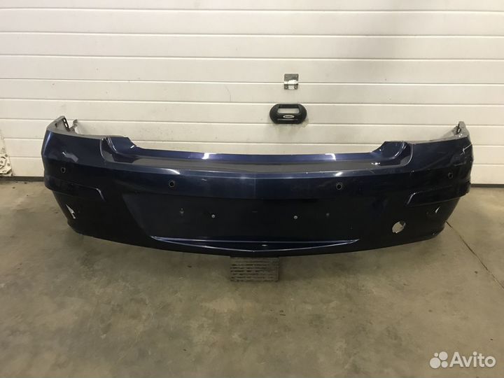 Задний бампер Opel Astra H