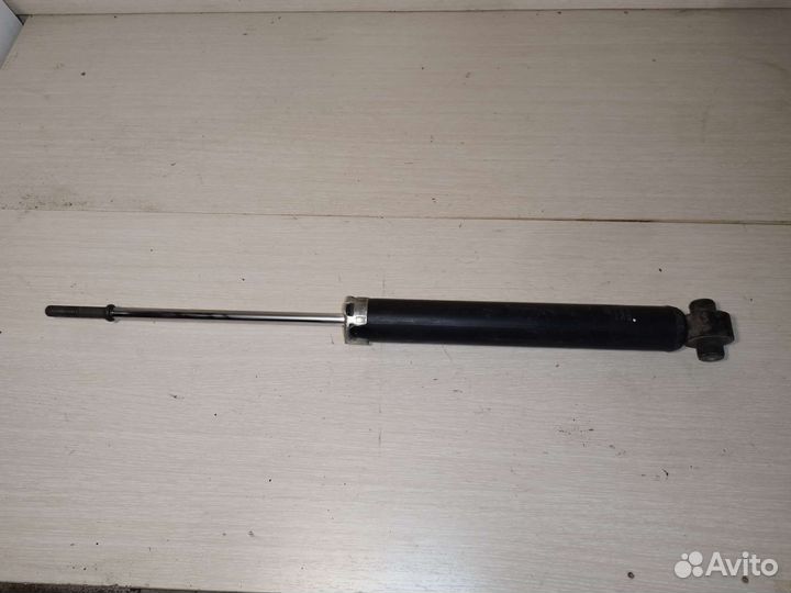 Амортизатор задний Toyota Corolla e15