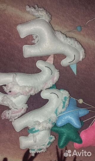 Музыкальный мобиль на кроватку