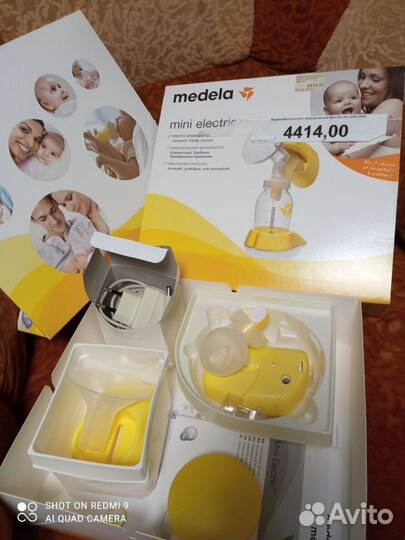 Молокоотсос medela электрический