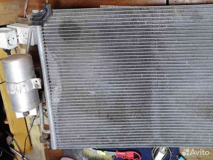 Радиатор кондиционера 52460418 Opel Omega B 2.5L