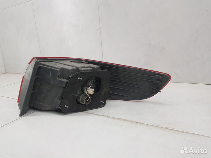 Фонарь задний левый наружный Kia Rio