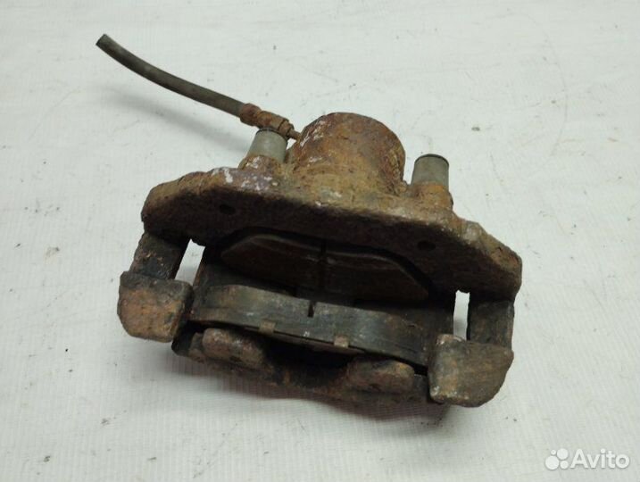 Суппорт тормозной передний левый Ford Fusion fyja