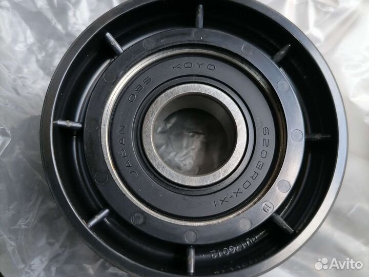 Ролик Renault 8200104754