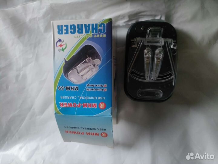 Зарядное устройство универсальное. Новое