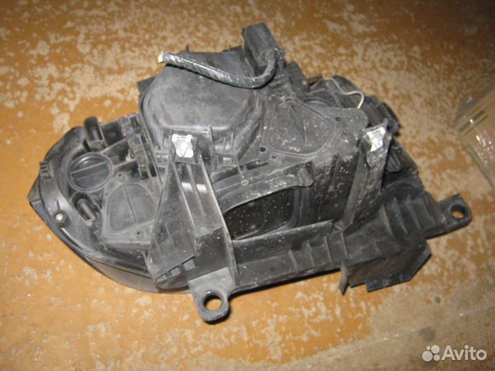 Фара левая BMW X3 E83