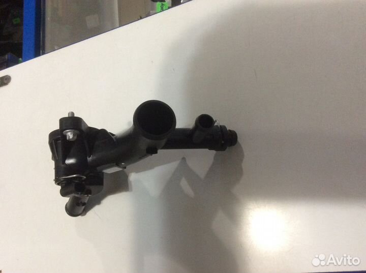 Корпус термостата Опель 1.4 турбо