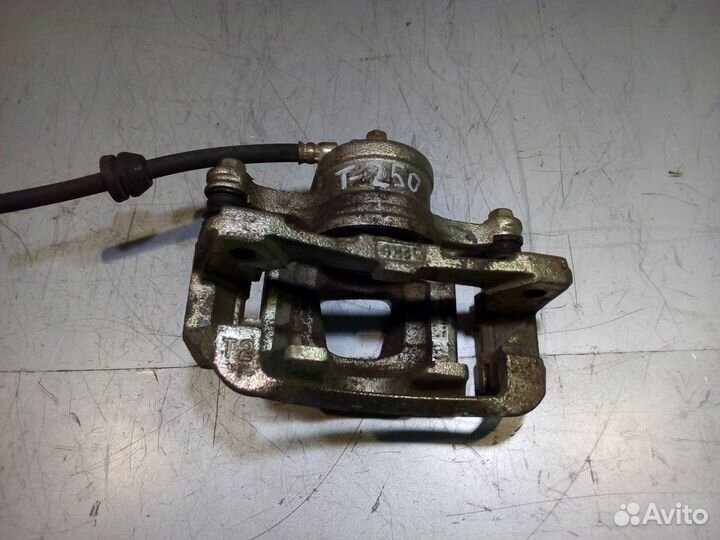 Суппорт тормозной передний левый Шевроле Авео Т250