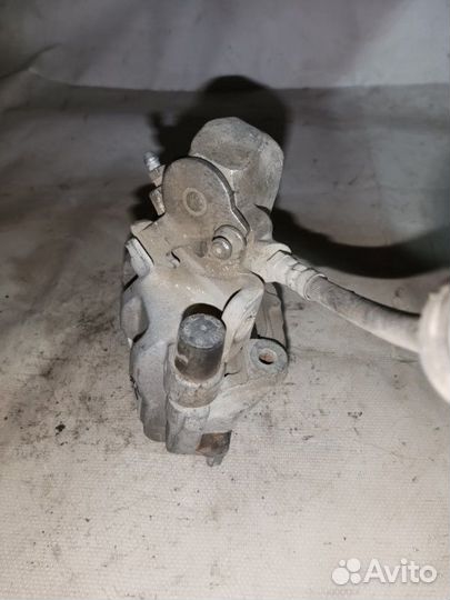 Суппорт тормозной задний правый Ford Focus 2