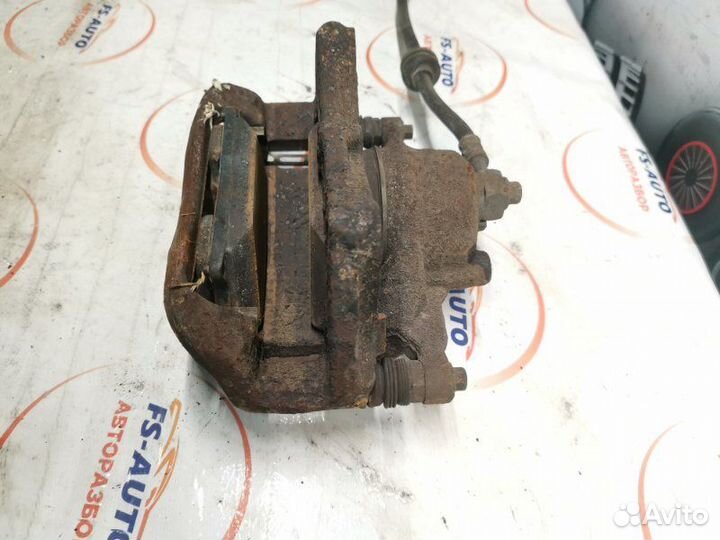 Суппорт тормозной передний левый Opel Mokka 1.6