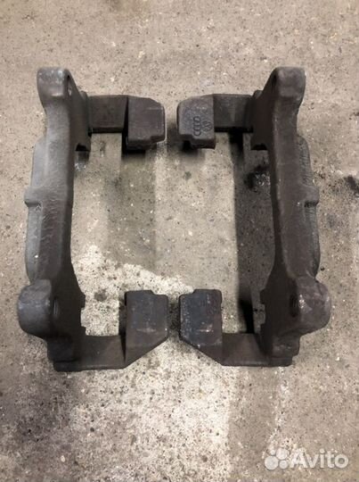 Скобы передних суппортов 312мм VW Passat B6 пара