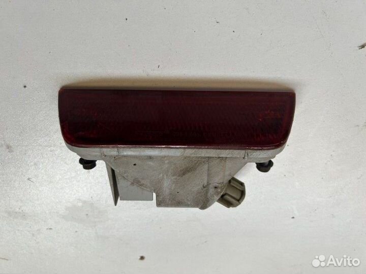 Фонарь противотуманный задний Nissan Almera G15