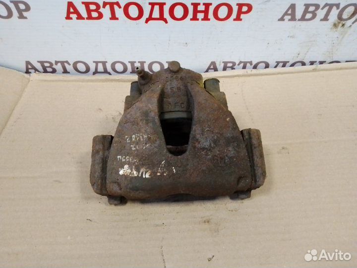 Суппорт тормозной передний левый Opel Zafira A