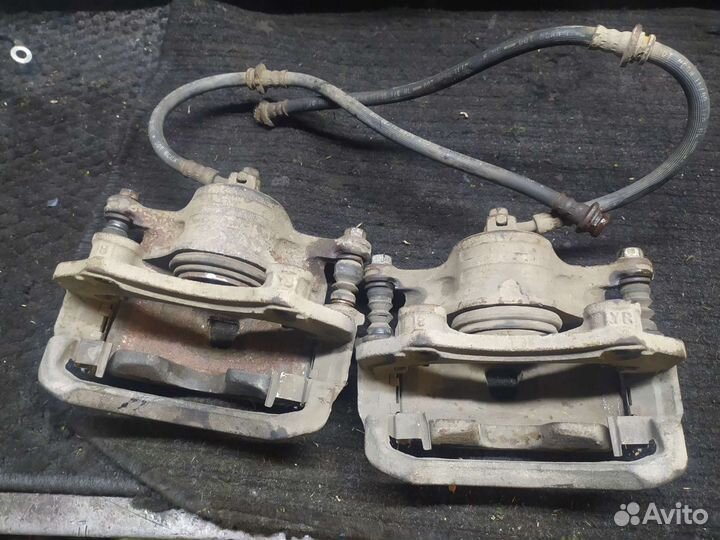 Суппорт левый QG15 (18) б/у