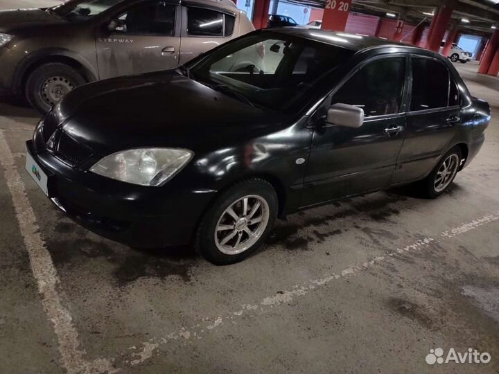 Mitsubishi Lancer 1.6 МТ, 2006, 265 400 км