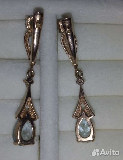 Золотые серьги с топазами