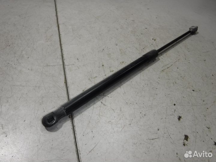 Амортизатор двери багажника Opel Astra H