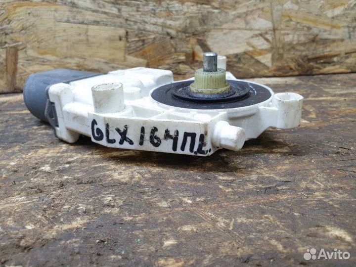 Моторчик стеклоподъемника передний левый