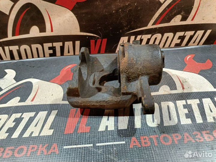 Суппорт тормозной передний Volkswagen Polo