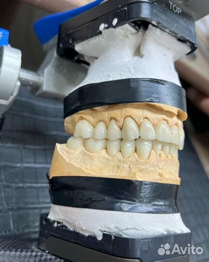 Зубной техник